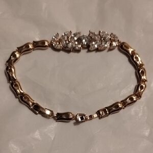Gold Bracelet with Crystal Leaf Design